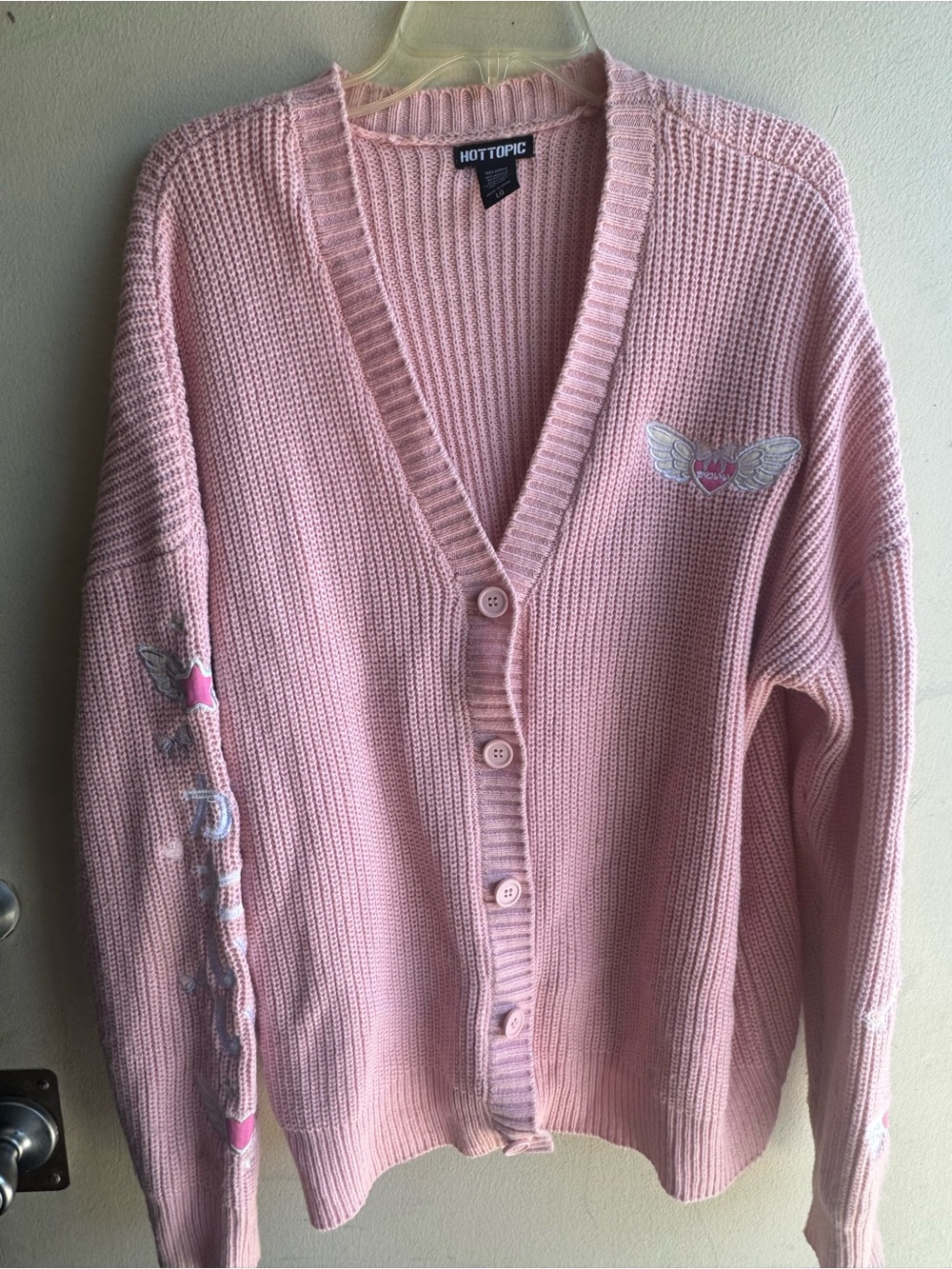 Hot Topic Light Pink Ribbed Button-Up Cardigan with Wing Embroidery